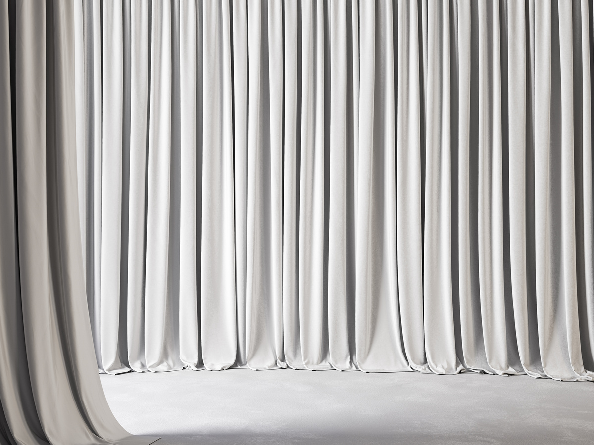 White empty interior with draping curtains and carpet.